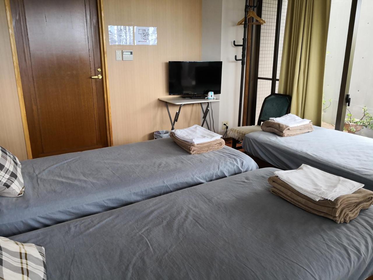 Atami Onsen Guest House Megumi Exterior photo